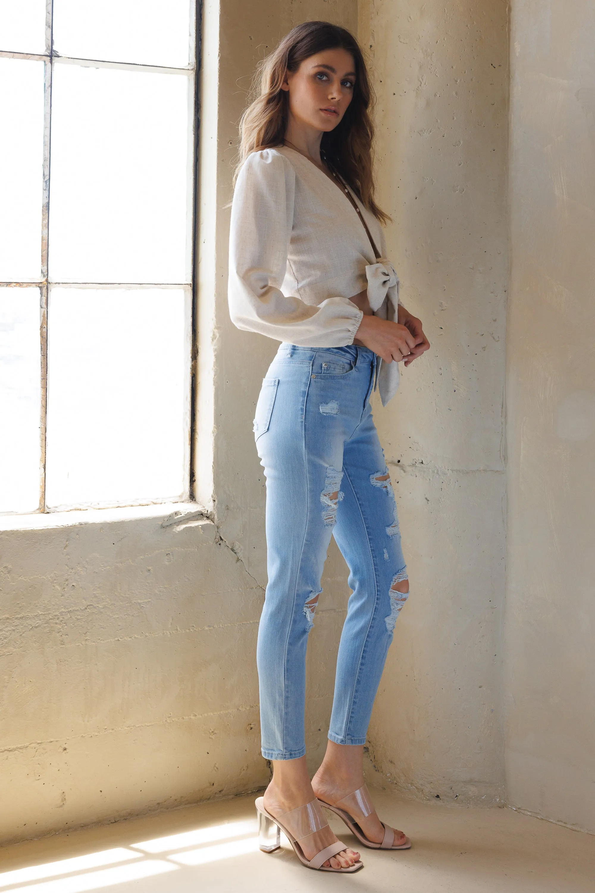 High Rise Destructed Faded Skinny Jeans