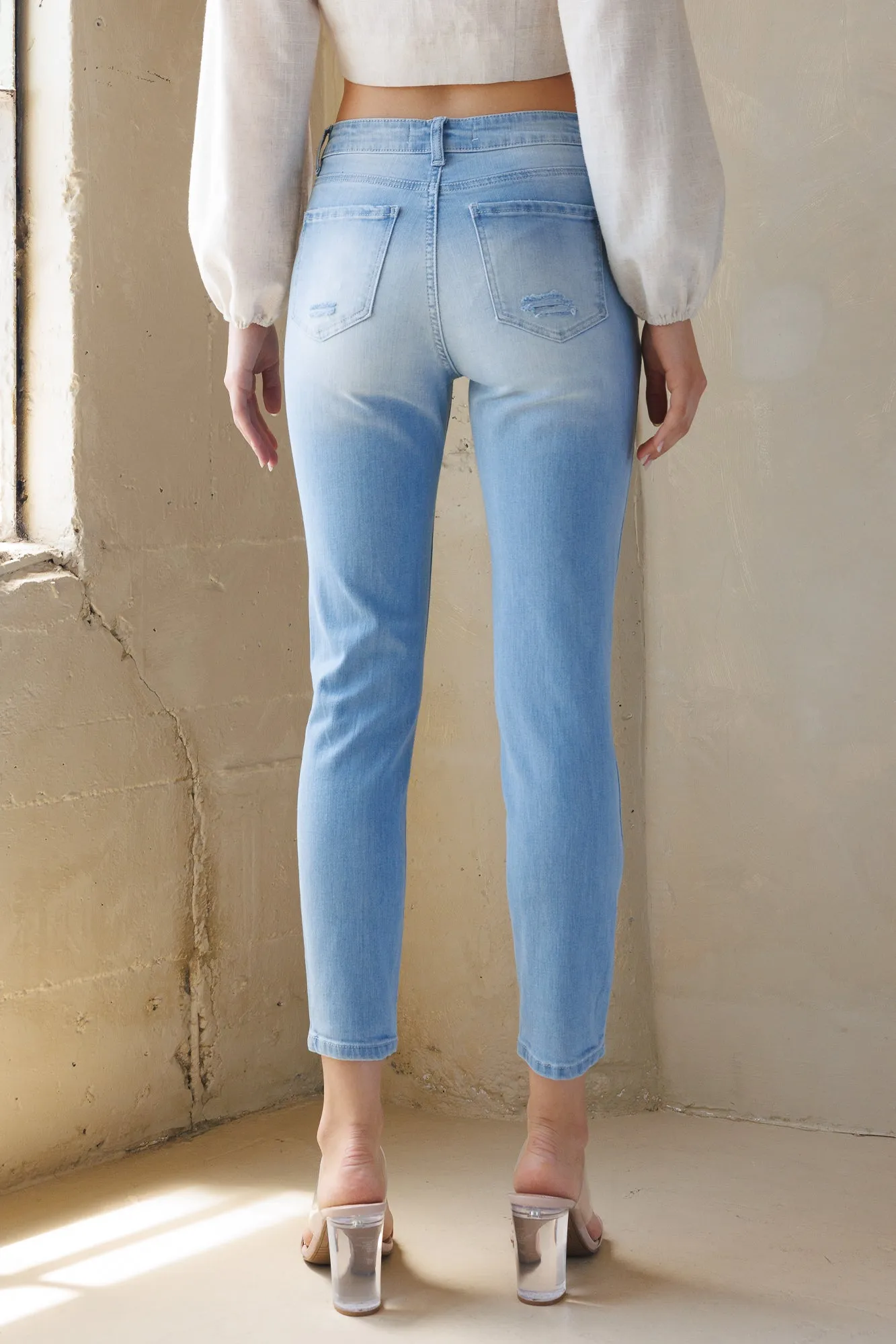 High Rise Destructed Faded Skinny Jeans
